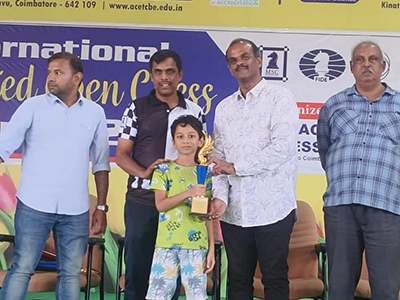 Piruthivan awarded for his performance during a competitive chess event.