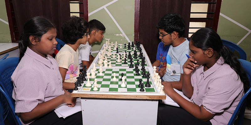 Offline chess classes use real boards and direct coaching to improve focus, understanding, and steady skill growth